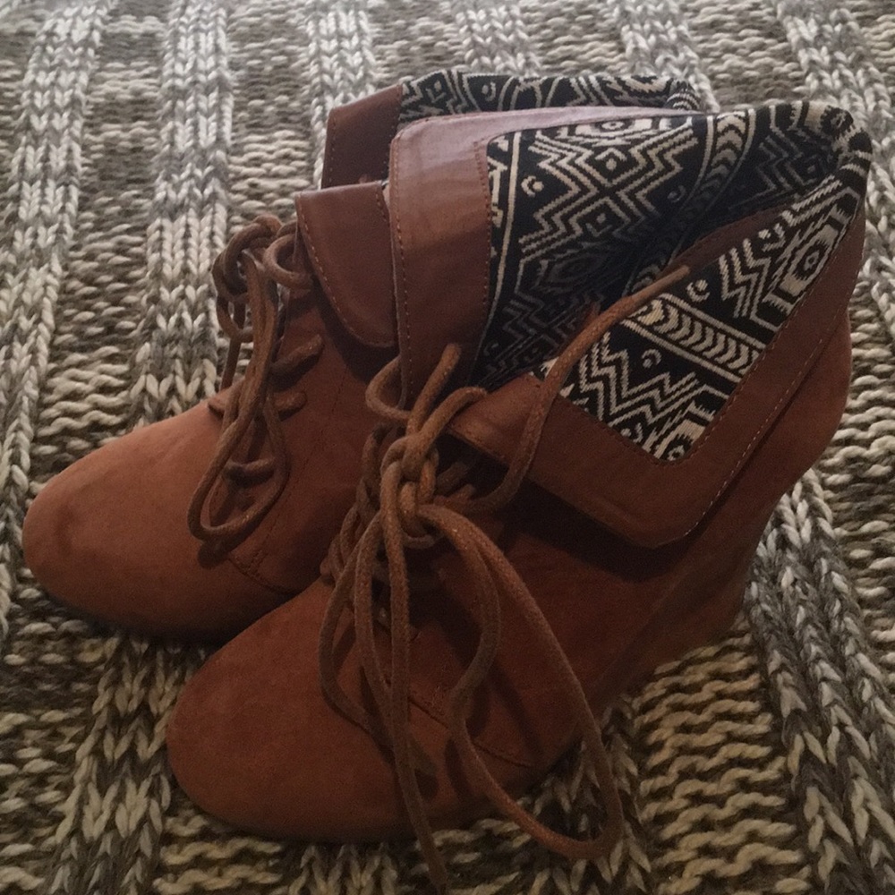 4 inch, never worn wedges, size 7.